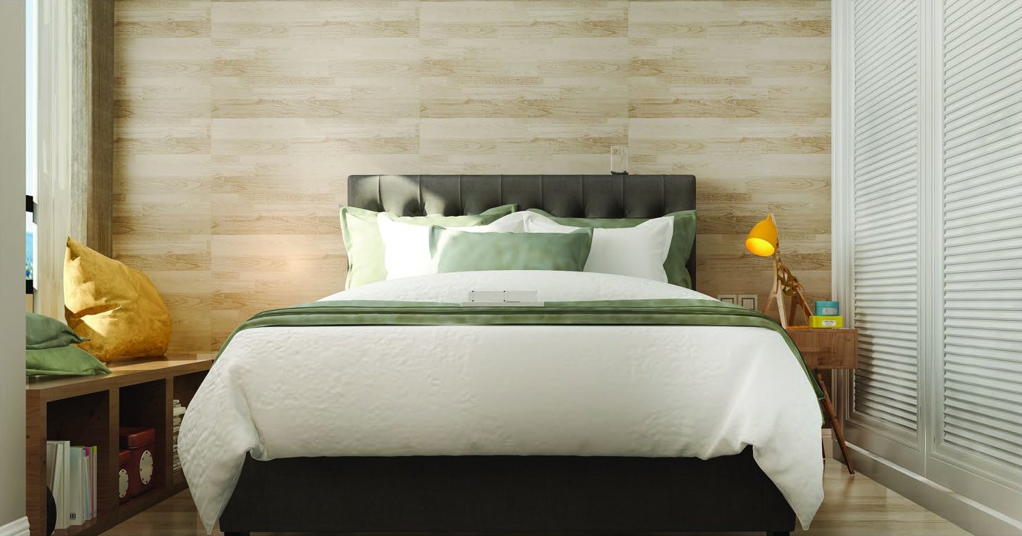 Interior — bedroom with upholstered bed and wood-panelled wall