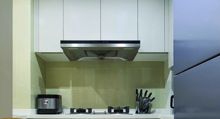 Interior — modern kitchen with chimney hood and gas hob